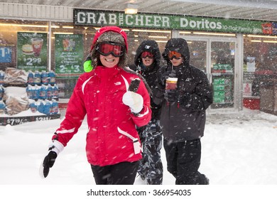 LEOLA, PA - JANUARY 23: An Unidentified Woman And Kids Leave A Convenience Store With Treats In Hand During Winter Storm Jonas On January 23, 2016 In Leola. 