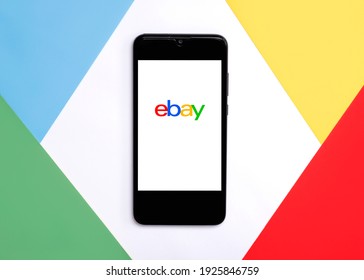 Leon-Spain-27 February 2021.Ebay logo on white screen of smartphone on colorful background.Ebay app