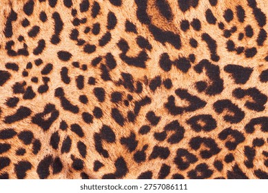 Leopard print fabric texture background close up
