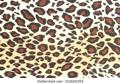 Leopard Print On Mass Produced Fabric. Abstract Animal Skin Patt