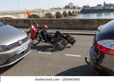 Les Ponts De Ce, Maine Et Loire / France - March 31 2019: Man Riding A Recumbent Bike. Cycling Season 2019