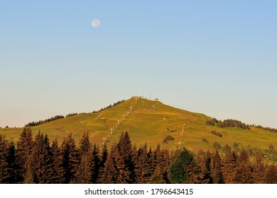 Les Saisies, Savoie/France - August 5 2020: The moon above the Mount Bisanne in the morning