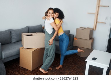 Lesbian, couple and hug with moving, boxes and excited with happiness for investment in apartment or property. Happy, people and women together with love and celebration of new home together - Powered by Shutterstock