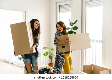 Lesbian Couple Moving Into A New Apartment	
