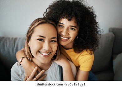 Lesbian, couple and portrait of hug on sofa in home, living room or apartment with love, support and happiness. Lgbt, women and profile picture together on lounge couch with smile on face in house - Powered by Shutterstock