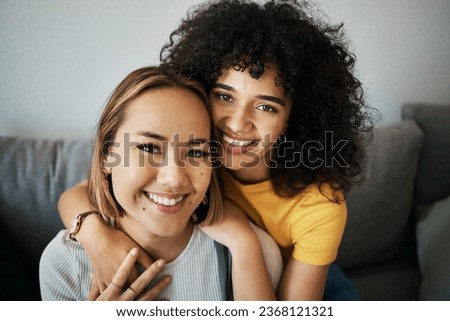 Lesbian, couple and portrait of hug on sofa in home, living room or apartment with love, support and happiness. Lgbt, women and profile picture together on lounge couch with smile on face in house