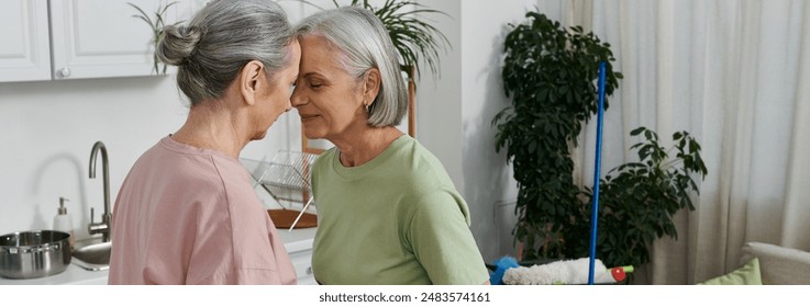 A lesbian couple shares a tender moment in their modern apartment while cleaning. - Powered by Shutterstock