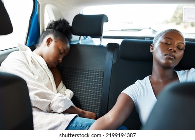 Lesbian Couple Sleeping In Car Or Taxi After Road Trip, Party And Fun Weekend As Gay Friends On Vacation Together. Tired African Lgbt People, Girls And Women Resting, Relax And Dreaming In Back Seat