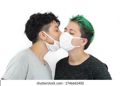 Lesbian Couple Wearing Protective Mask Kissing Valentine