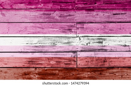 Lesbian Pride Flag Painted On Wooden Background, Closeup.