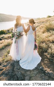 Lesbian Wedding Couple In White Dresses