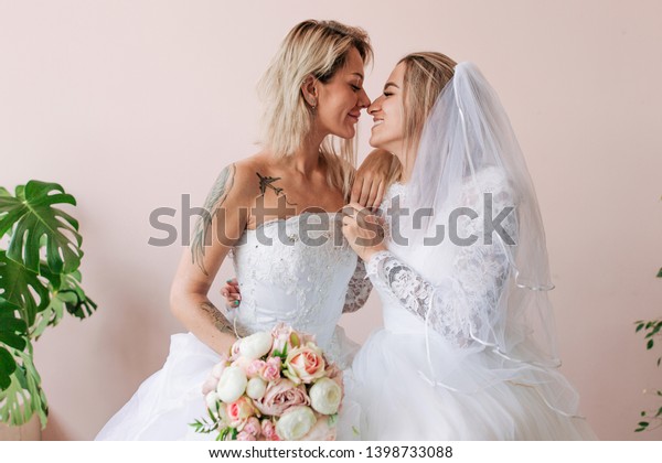 Lesbian Wedding Dresses Holding Bouquet Flowers Stock Image