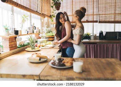 Lesbian Women Cooking Breakfast