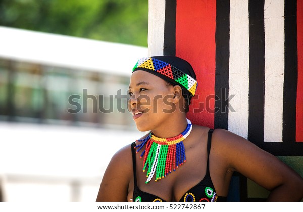 Zulu Woman Wearing Handmade Clothing At Lesedi Cultural 