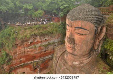 The Leshan Giant Buddha is a 71-metre (233 ft) tall stone statue, built between 713 and 803 (during the Tang dynasty)