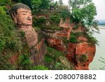 The Leshan Giant Buddha is a tall stone statue, built during the Tang dynasty. It is carved out of a cliff face of Cretaceous red bed sandstones in the southern part of the Sichuan province of China