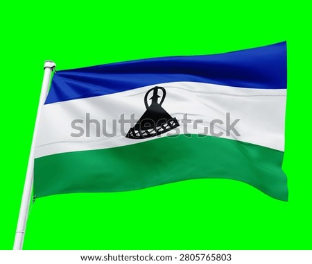 Lesotho flag waves gracefully on a white pole against a bright green screen background featuring horizontal blue white and green stripes with a black traditional mokorotlo hat symbol centered prominently to represent national pride and sovereignty in this high quality digital render.