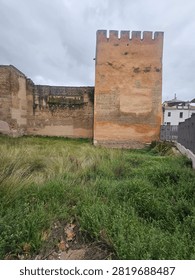The less impressive side view of the massive Puerta de Elvira, one of the main gates of the Moorish city of Granada, Spain. 