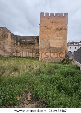 The less impressive side view of the massive Puerta de Elvira, one of the main gates of the Moorish city of Granada, Spain. 