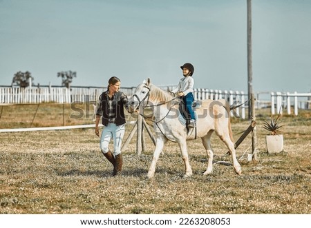 .Lesson, help and woman with a child on a horse for learning, sports and hobby on a farm in Italy. Helping, support and coach teaching a girl horseback riding for a physical activity in countryside.