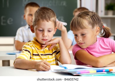 lesson with the teacher at school - Shutterstock ID 84603742