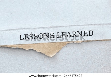 LESSONS LEARNED text on white background