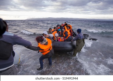 Lesvos island, Greece - 29 October 2015. Syrian migrants / refugees arrive from Turkey on boat through sea with cold water near Molyvos, Lesbos on an overload dinghy. Leaving Syria that has war