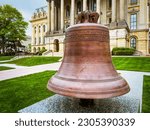 Let Freedom Ring! Historic Liberty Bell in front of the Illinois State Capitol Building in Springfield, Illinois, USA.