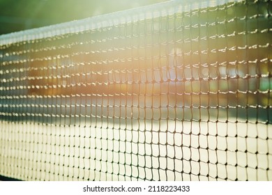 Let the games begin. Closeup shot of a tennis net on a tennis court.