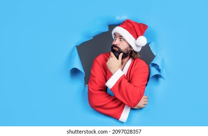 Let Me See. New Year Party. Celebrate Winter Holidays. Merry Christmas To You. Xmas Shopping Time. Prepare Gifts And Presents. Just Have Fun. Happy Bearded Mature Man In Santa Claus Costume