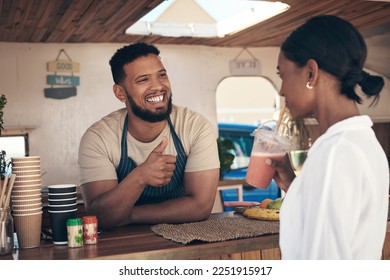 let me tell you my story. Shot of a woman buying and drinking a smoothie from a food truck. - Powered by Shutterstock