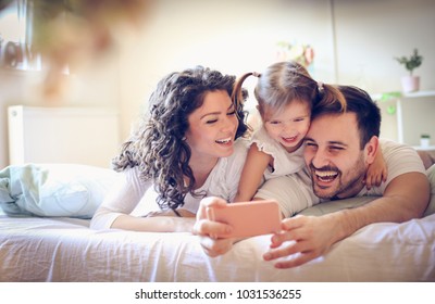 Let take a photo of our happy family.  - Powered by Shutterstock