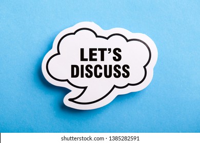 Let Us Discuss speech bubble isolated on the blue background.
