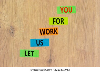 Let Us Work For You Symbol. Concept Words Let Us Work For You On Colored Paper. Beautiful Wooden Background. Business And Let Us Work For You Concept. Copy Space.