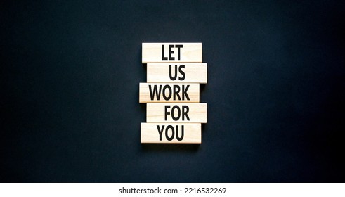 Let Us Work For You Symbol. Concept Words Let Us Work For You On Wooden Blocks. Beautiful Black Table Black Background. Business And Let Us Work For You Concept. Copy Space.