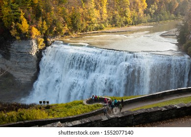 LETCHWORTH STATE PARK, UPSTATE NEW YORK- OCTOBER 20, 2019: People Standing Overlooking Middle Falls At Letchworth State Park In Upstate New York Which Draws Many Tourists Each Year.