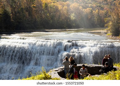 LETCHWORTH STATE PARK, UPSTATE NEW YORK- OCTOBER 20, 2019: People Standing Overlooking Middle Falls At Letchworth State Park In Upstate New York Which Draws Many Tourists Each Year.