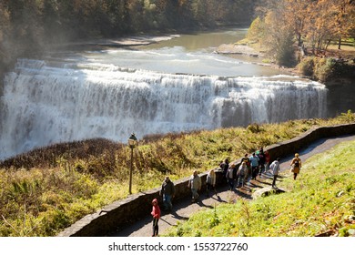 LETCHWORTH STATE PARK, UPSTATE NEW YORK- OCTOBER 20, 2019: People Standing Overlooking Middle Falls At Letchworth State Park In Upstate New York Which Draws Many Tourists Each Year.