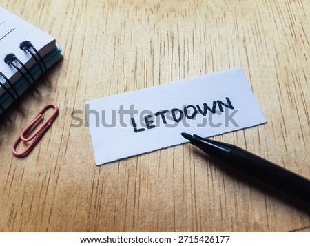 Letdown writting on table background. 