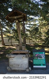 Lethbridge, Canada - October 5, 2021. Wishing well in a japanese garden.