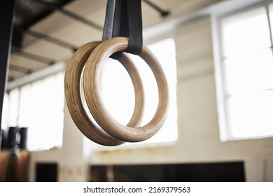 Lets build some muscle. Still life shot of gymnastic rings in a gym. - Powered by Shutterstock