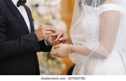 Let's Get Married, Couple Exchanging Wedding Rings 