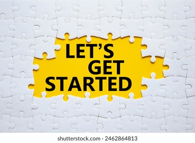 Lets get started symbol. Concept words Lets get started on white puzzle. Beautiful yellow background. Business and Lets get started concept. Copy space.