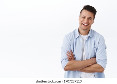 Lets Get Straight Business. Portrait Of Carefree, Relaxed Laughing Young Man, Cross Arms Over Chest In Ready, Professional Pose, Look Camera Enthusiastic, Managing Own Small Store, White Background