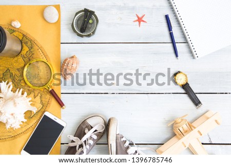 Let's go to new adventures and discoveries. Travel accessories. World map, watches, aircraft and others. Travel concept background. Travel Plans with a Map