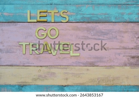 lets go travel write on wooden background - summer travel