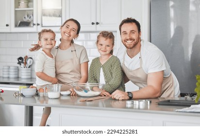 Lets make something delicious and cool. Shot of adorable little girls baking with their parents at home.