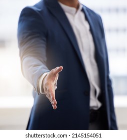 Lets Make This Happen. Cropped Shot Of A Businessman Holding His Hand Out For A Handshake.