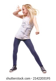 Lets Party. Full Length Shot A Young Girl Dancing Against White Background.