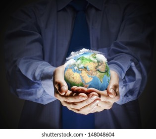 Let's save our planet earth. Ecology concept. Elements of this image are furnished by NASA - Shutterstock ID 148048604
